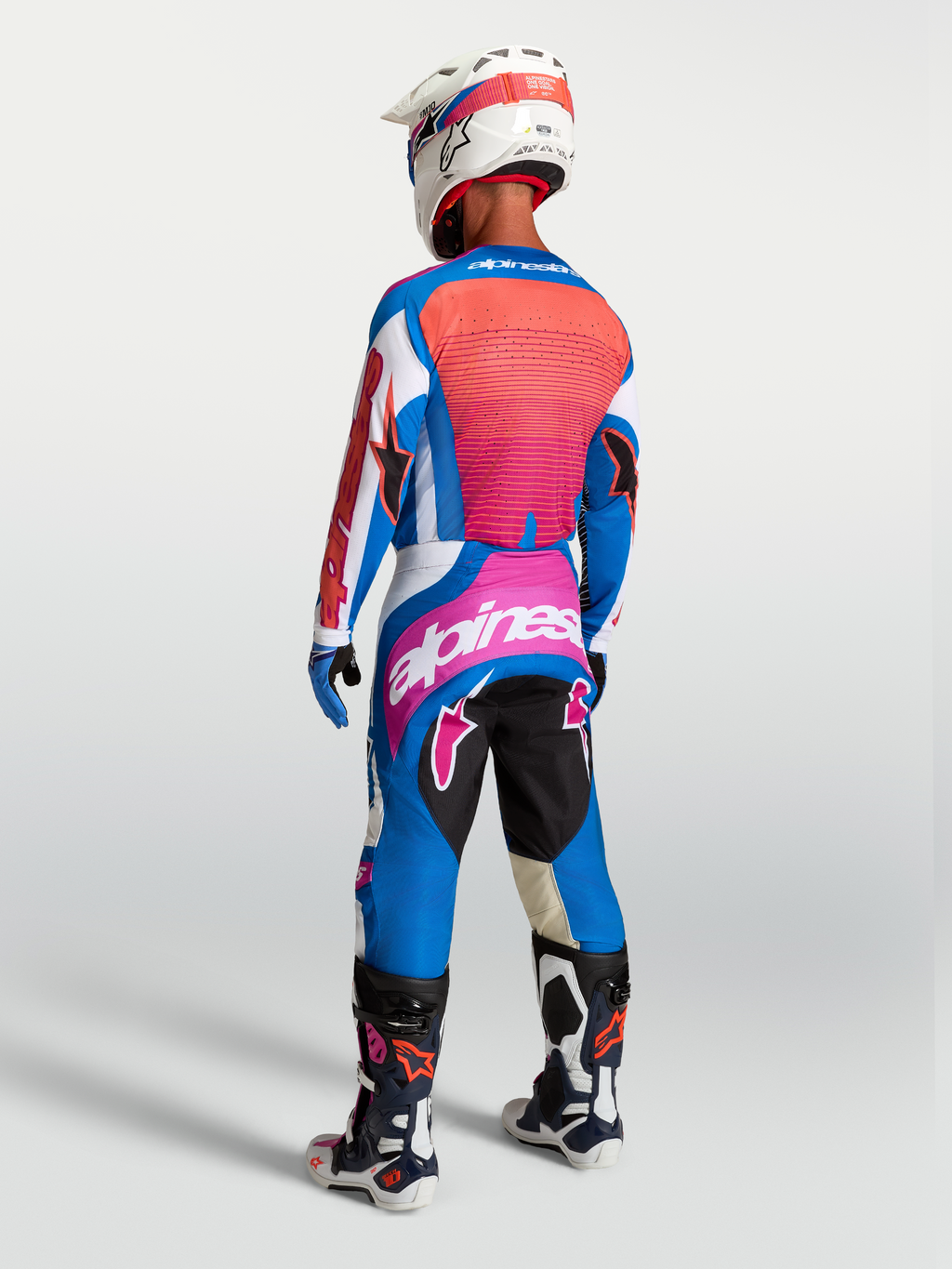 Alpinestars Techstar Maven Pants in Blithe Blue and Hot Coral, high-performance motocross gear with a race-fit design.