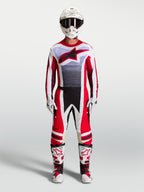Alpinestars Techstar Maven Pants and motocross gear set in fire red and white with lavender accents and matching boots.