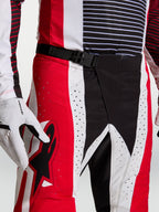 Alpinestars Techstar Maven Motocross Pants, Red and Black, featuring SX2 Magnetic Waist Closure and laser perforations.