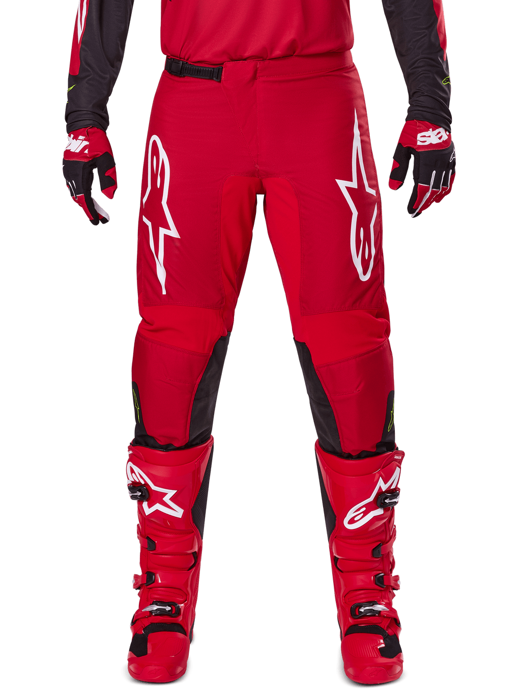Alpinestars 2025 Fluid Haul Pants, Motocross Pants, Bright Red and Black, featuring large white logos on the thighs and black inner leg panels, worn with matching red boots and gloves, athletic fit for motocross performance