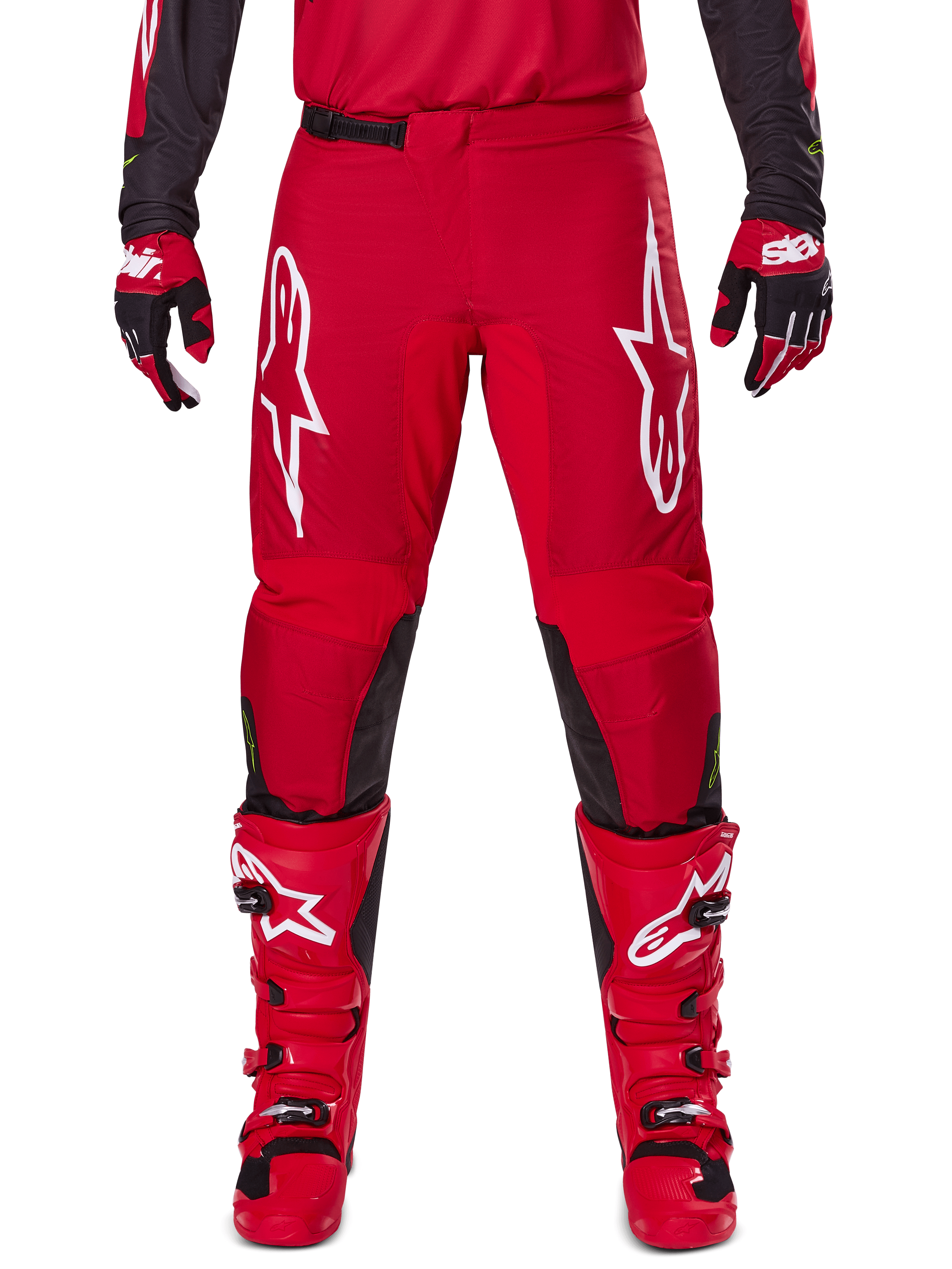 Alpinestars 2025 Fluid Haul Pants, Motocross Pants, Bright Red and Black, featuring large white logos on the thighs and black inner leg panels, worn with matching red boots and gloves, athletic fit for motocross performance
