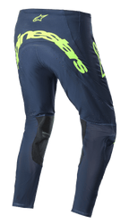 Alpinestars 2023 Supertech Bruin Pants, Motocross Pants, Night Navy and Yellow Fluo, rear view featuring large fluorescent yellow Alpinestars branding across the seat, perforated ventilation zones, and black inner-leg reinforcements.