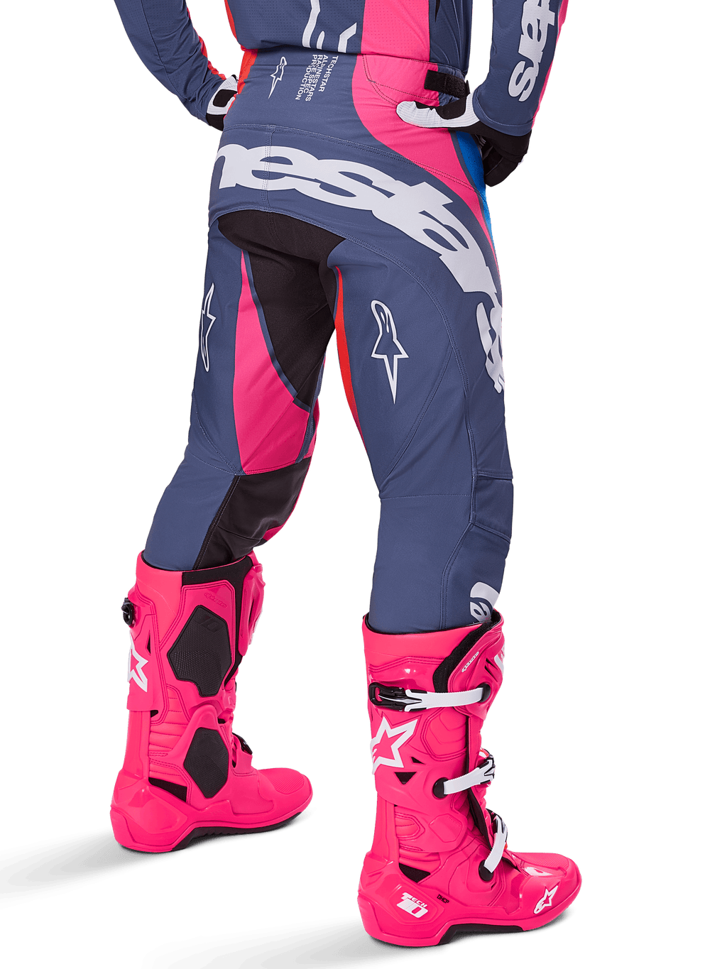 Alpinestars 2025 Techstar Dreem Pants, Motocross Pants, Gray and Pink Multicolor, rear view featuring large white Alpinestars branding across the seat, worn with matching bright pink Tech 10 boots, durable off-road racing gear with reinforced panels.