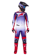 Alpinestars 2025 Fluid Wurx Gear Set, Motocross rider in purple, white, and bright red jersey and pants, black helmet with blue goggles, red motocross boots and matching gloves, athletic racing design for off-road performance