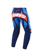 Alpinestars 2026 Techstar Nomur Pants, Motocross Pants, Dark Navy, Orange, and UCLA Blue, back view featuring a bold white astars logo on an orange panel, multi-panel design with light blue accents, black inner knee panels, durable gear for off-road racing.