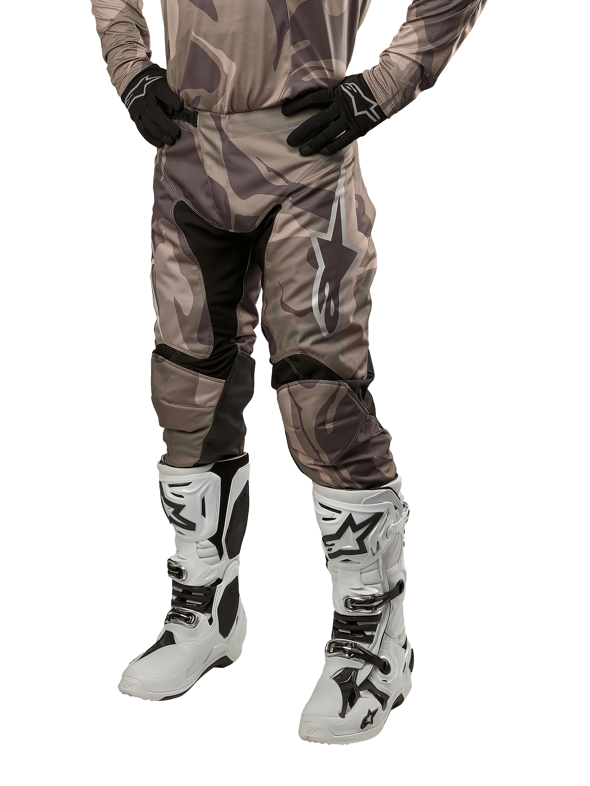 Alpinestars 2024 Racer Tactical Pants, Motocross Pants, Military Green Camo Brown, worn with matching camouflage jersey, black gloves, and white boots with star logos, featuring black stretch panels and ergonomic design, off-road gear setup on white background