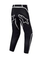 Alpinestars Fluid Apex V2 Pants, Black and Silver Motocross gear, rear view with reinforced seat and A-star logo.