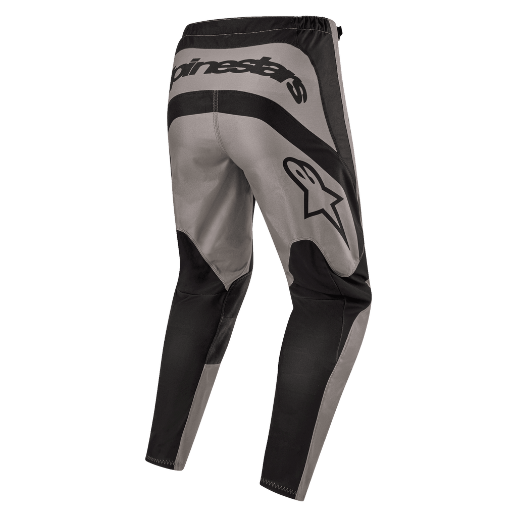 Alpinestars 2024 Fluid Lurv Pants, Motocross Pants, Mud Black, rear view showing bold Alpinestars branding across the back and star logo on the right thigh, grey and black paneled design with durable 600D poly-fabric for off-road riding.