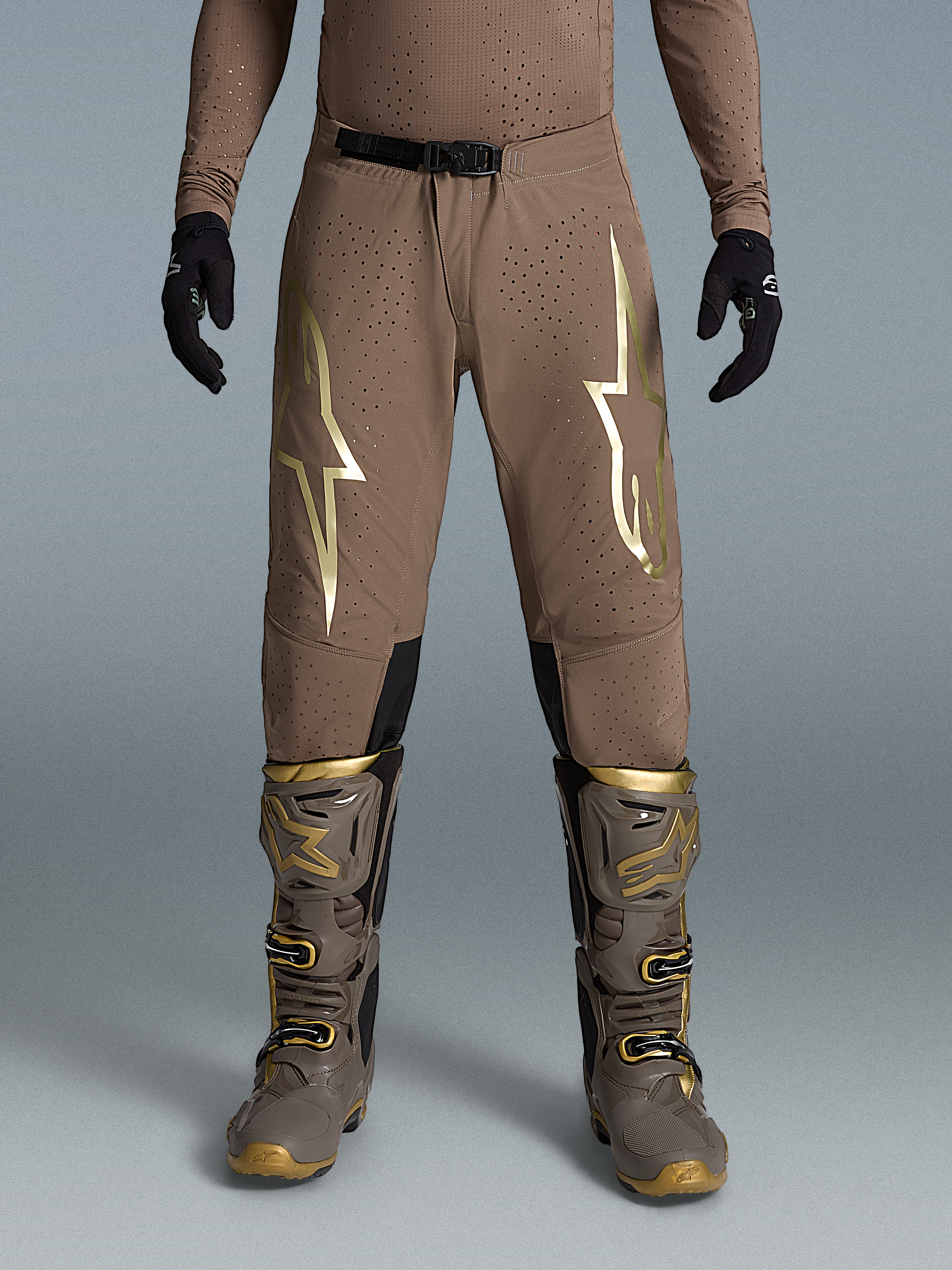 Alpinestars Limited Edition Supertech Air Gold Pants, Men's Brown and Gold Motocross Gear with ventilated rip-stop fabric.