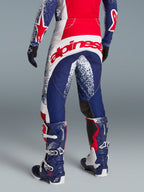 Alpinestars Limited Edition Techstar Unity Gear Set, red and blue motocross gear with athletic fit and bold rear branding.