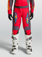 Alpinestars Youth Fluid Hunt Pants, red and gray motocross pants for off-road riding with ergonomic polyfabric design.