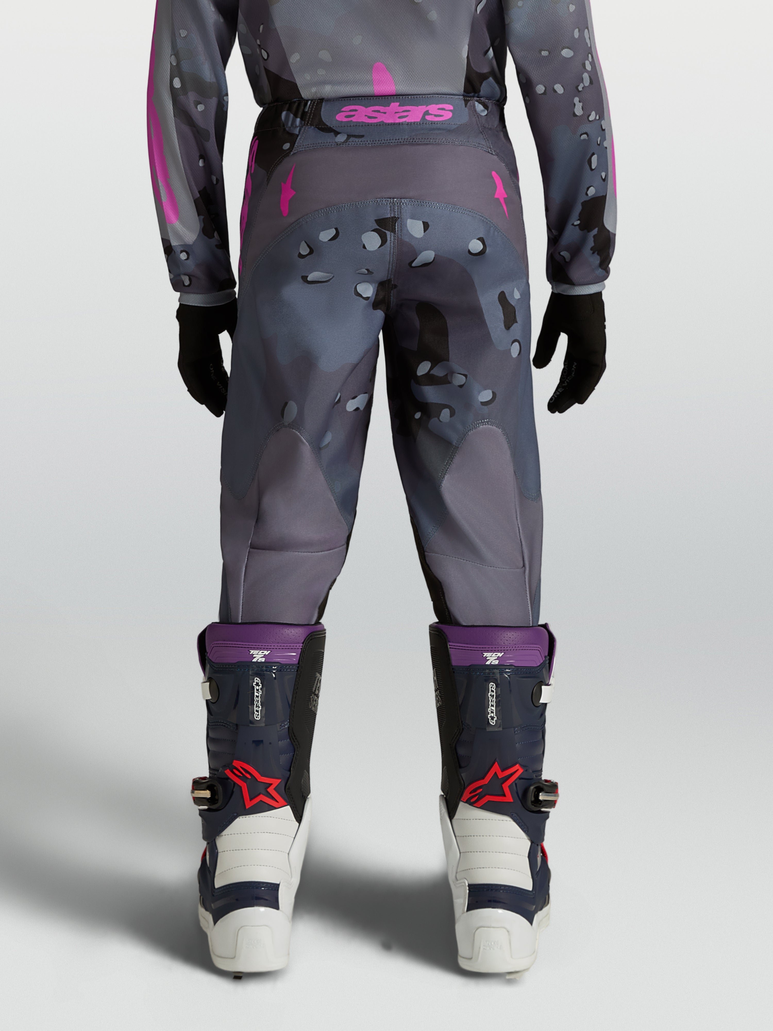 Alpinestars Youth Fluid Lone Pants for motocross, Gray Camo and Purple textile, rear view on model.