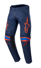 Alpinestars 2023 Youth Racer Narin Pants, Motocross Pants, Night Navy and Hot Orange, featuring bright orange logo graphics on thighs and knees, blue accents, black inner leg panels, durable textile construction for off-road racing