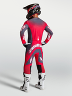 Alpinestars Supertech Hiten AFD Jersey and Gear Set, Red Fluo and Graystone Motocross Outfit, on-model rear view.