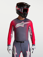 Alpinestars Supertech Hiten AFD Jersey, gray and red fluo motocross shirt with premium ventilated mesh.