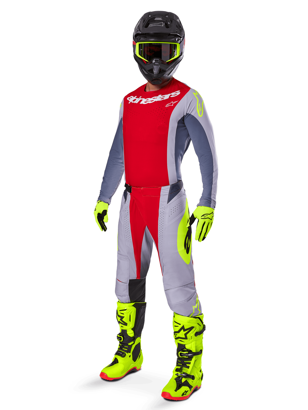 Motocross rider wearing Alpinestars 2025 Techstar Melt Jersey in Bright Red and Gray, featuring a red chest and gray sleeves with fluorescent yellow accents. Paired with matching pants, bright yellow racing boots and gloves, and a black helmet with yellow-framed goggles for a complete off-road racing kit.