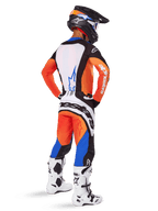 Motocross rider from a rear view wearing the 2025 Techstar Melt Gear Set, Orange and Blue jersey with white back panel and blue star logo, matching orange and blue pants with white Alpinestars branding, black helmet with blue graphics, and white motocross boots, coordinated off-road racing outfit.