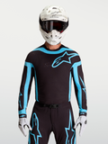 Alpinestars 2027 Supertech Vesta Jersey, men's black and turquoise motocross racing top with laser-cut stretch mesh panels.