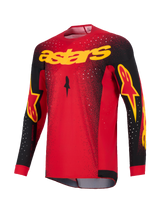 Alpinestars 2026 Supertech Scenz Jersey, Motocross Jersey, Red Black and Yellow, featuring yellow 'astars' branding on the chest, black sleeves with logo accents, and white speckled pattern on the shoulders and upper body