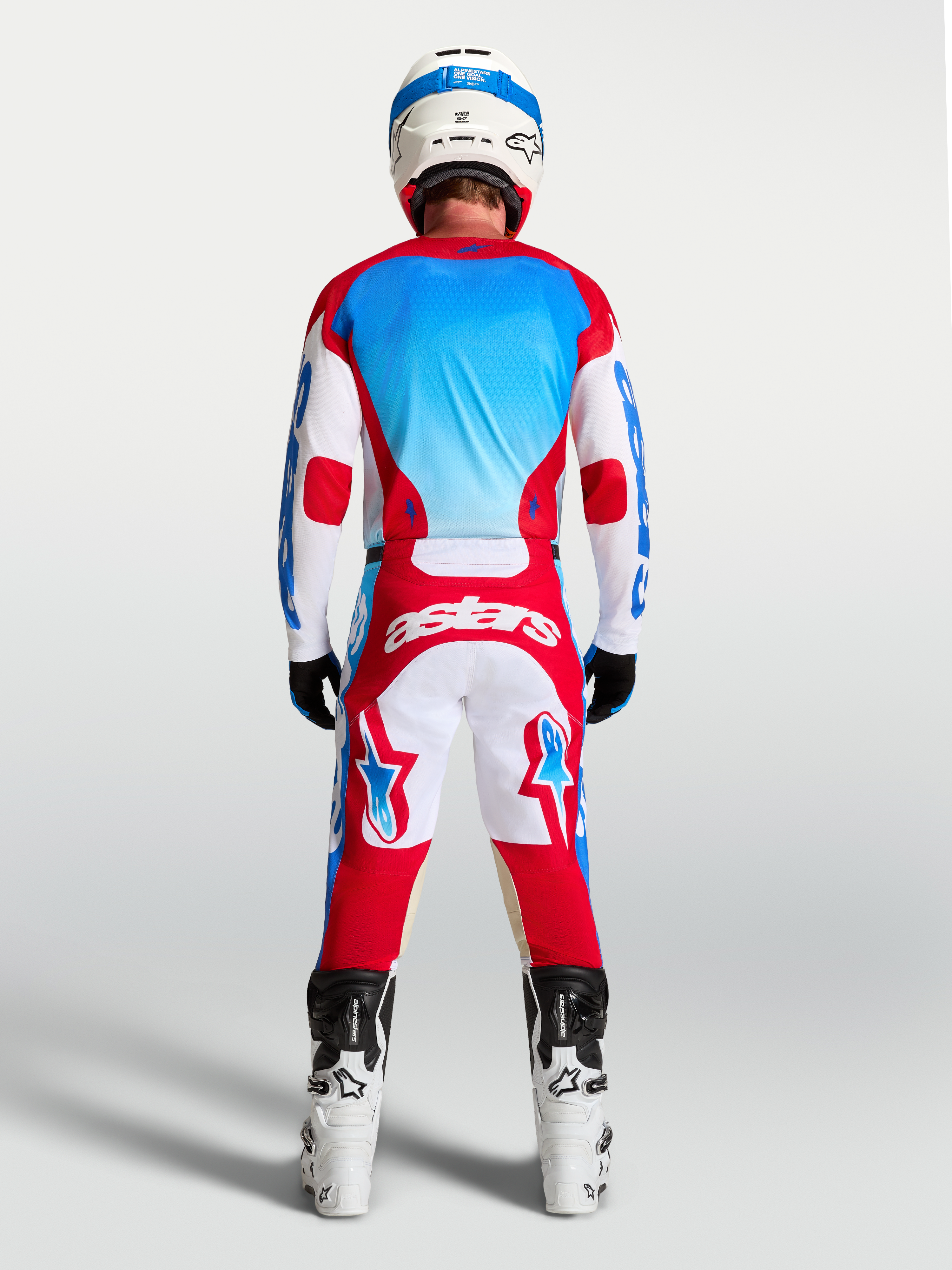 Alpinestars 2027 Racer Hunt Jersey, Men's Motocross Jersey, Rear View, White, Fire Red, and UCLA Blue moisture-wicking textile.