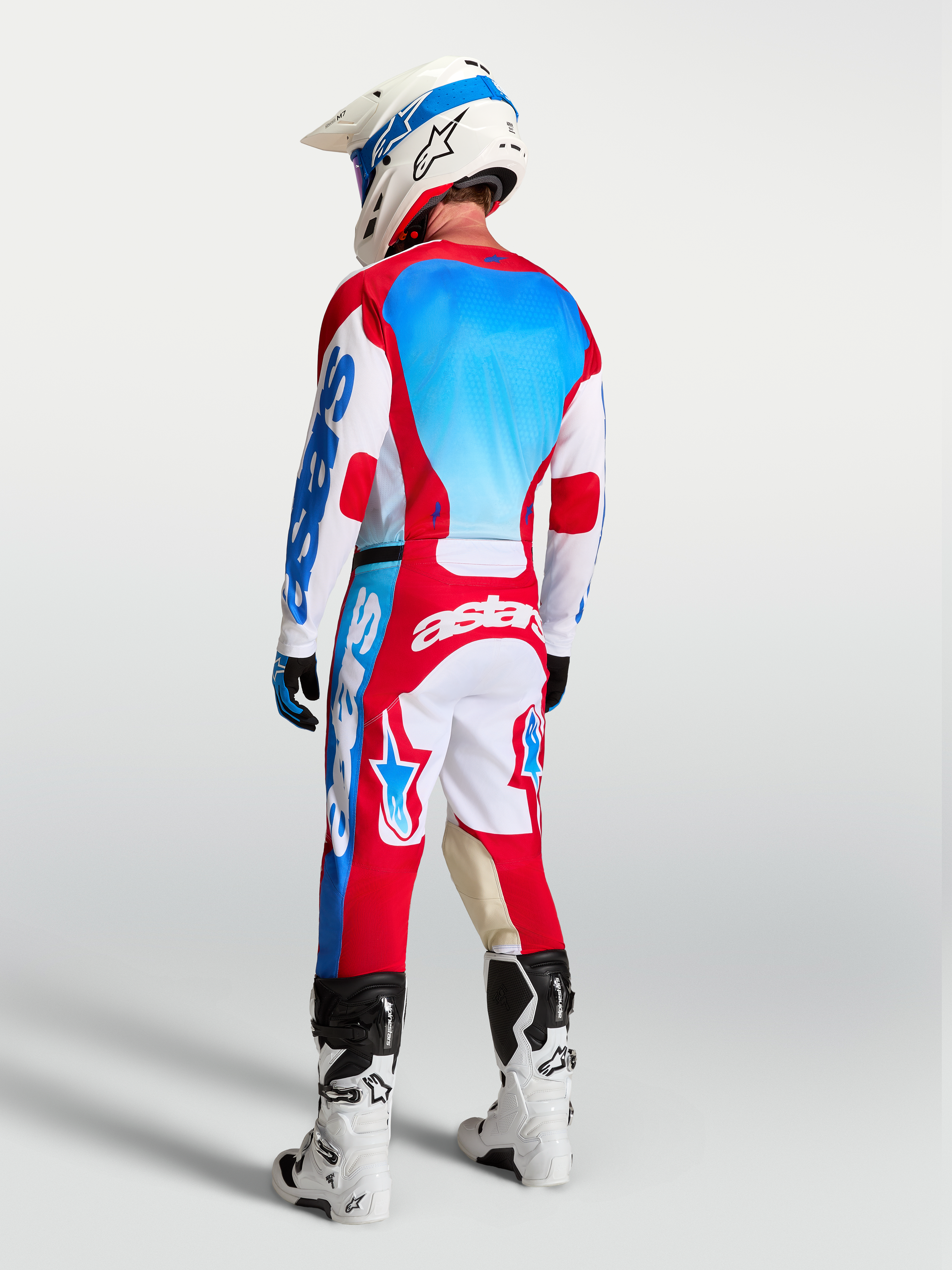 Alpinestars Racer Hunt Pants AND Gear Set, Motocross Racing Gear, Men, Red, White, and UCLA Blue, rear view on rider.