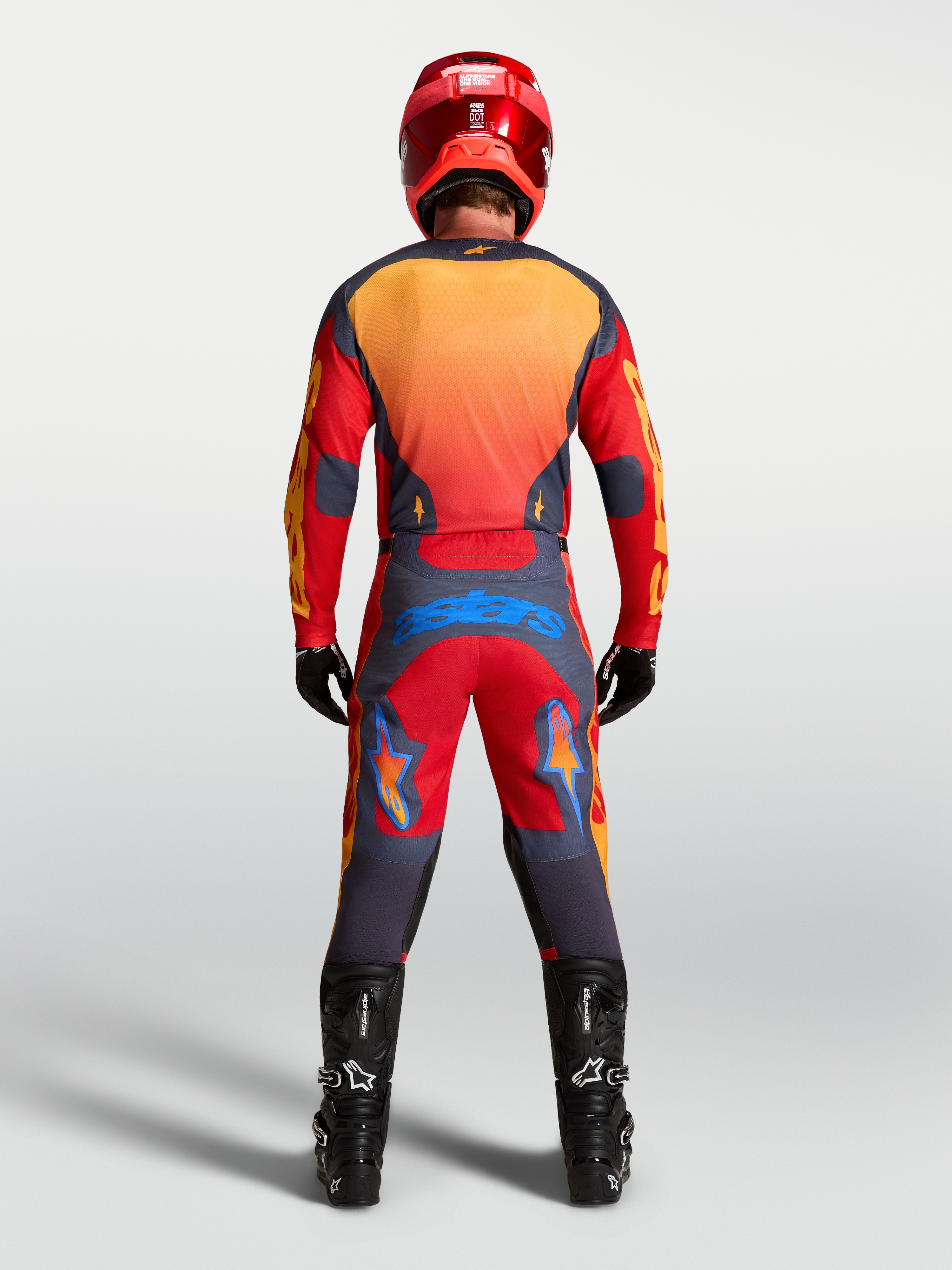 Alpinestars Racer Hunt Jersey, Men's Motocross Gear, Red and Graystone, moisture-wicking textile, rear view on rider.