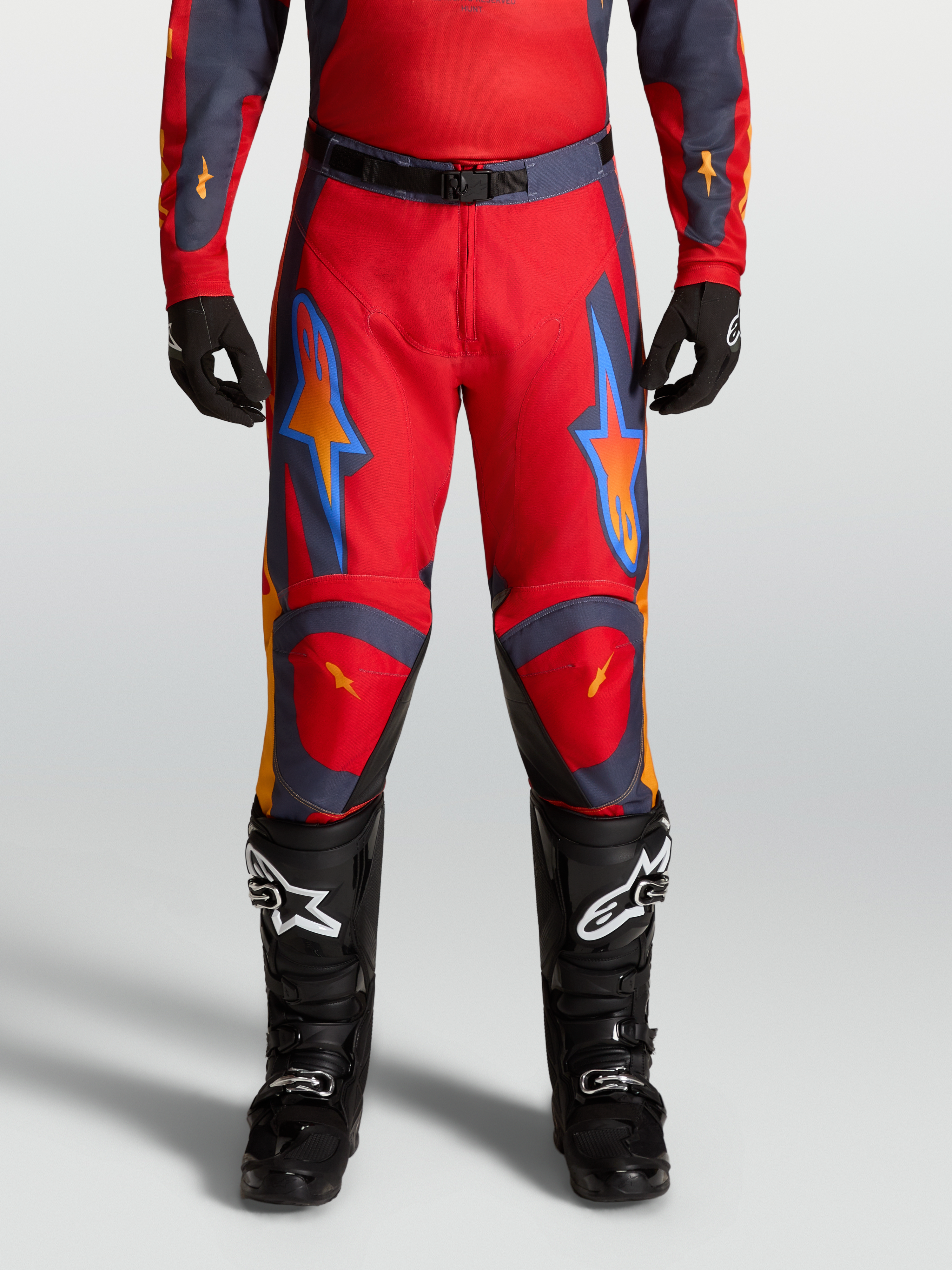 Alpinestars Racer Hunt Pants, Fire Red and Graystone Motocross Pants for Men, pre-curved race fit with reinforced knees.