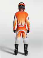 Alpinestars Racer Amber Jersey, rear view on-model, orange and white motocross jersey with breathable race fit.