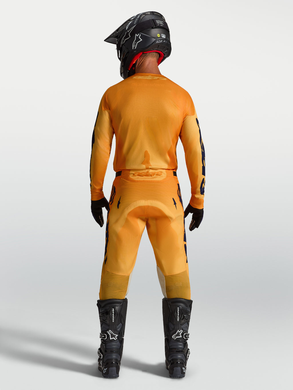 Alpinestars 2027 Racer Amber Jersey and Gear Set, Men's Motocross Outfit, Orange and Deep Blue, full back view.