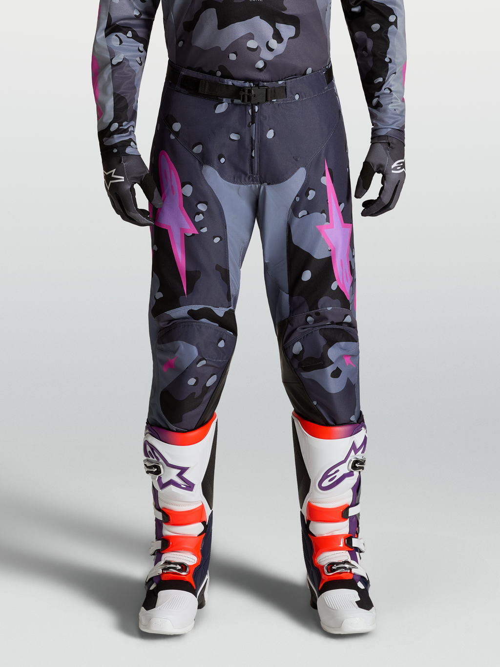Alpinestars Racer Lone Pants, Motocross Racing Pants for Men in Gray Camo and Purple, featuring lightweight 600D polyfabric and pre-curved leg construction for off-road performance.