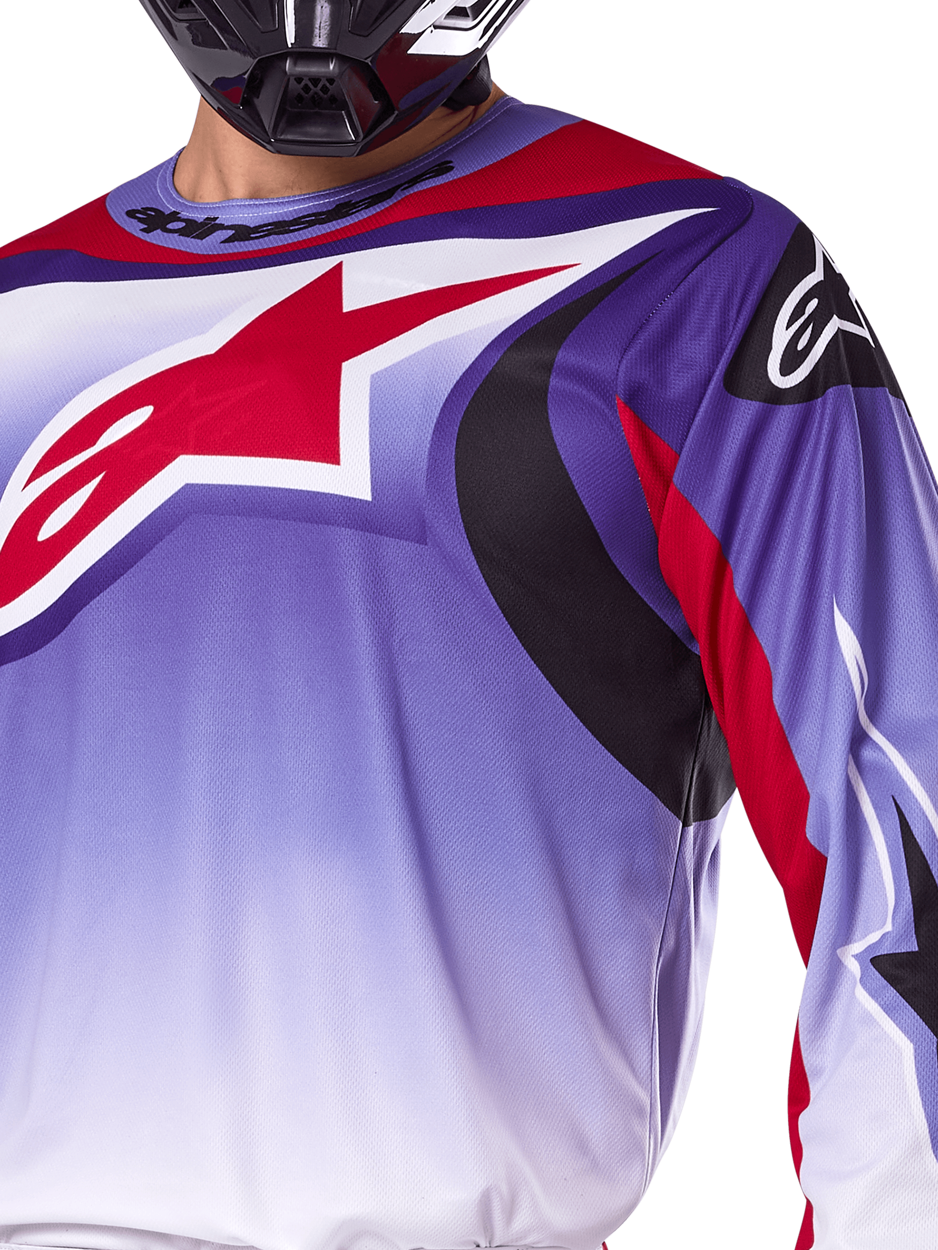 Alpinestars 2025 Fluid Wurx Jersey, Motocross Jersey, Purple and Bright Red, close-up of rider wearing jersey with large red Alpinestars star logo on chest, black and red curved graphic accents, athletic fit for off-road racing