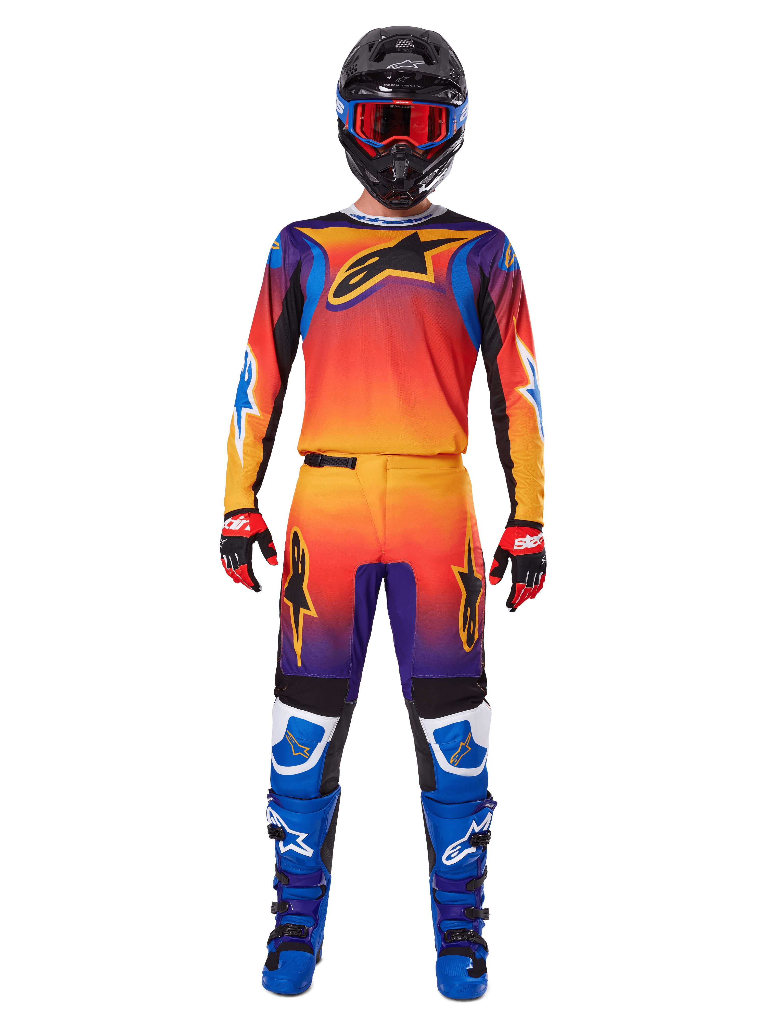 Motocross rider wearing the Alpinestars 2025 Fluid Wurx Gear Set, featuring a vibrant orange, yellow, and blue gradient on the jersey and pants, black Alpinestars logos, paired with blue racing boots, red and black gloves, and a black helmet with red goggles, complete coordinated outfit for off-road racing