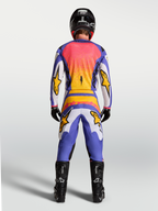 Alpinestars Fluid Drag Jersey, Men's Blue and Lilac Motocross Jersey with Gold accents, shown from behind on-model.