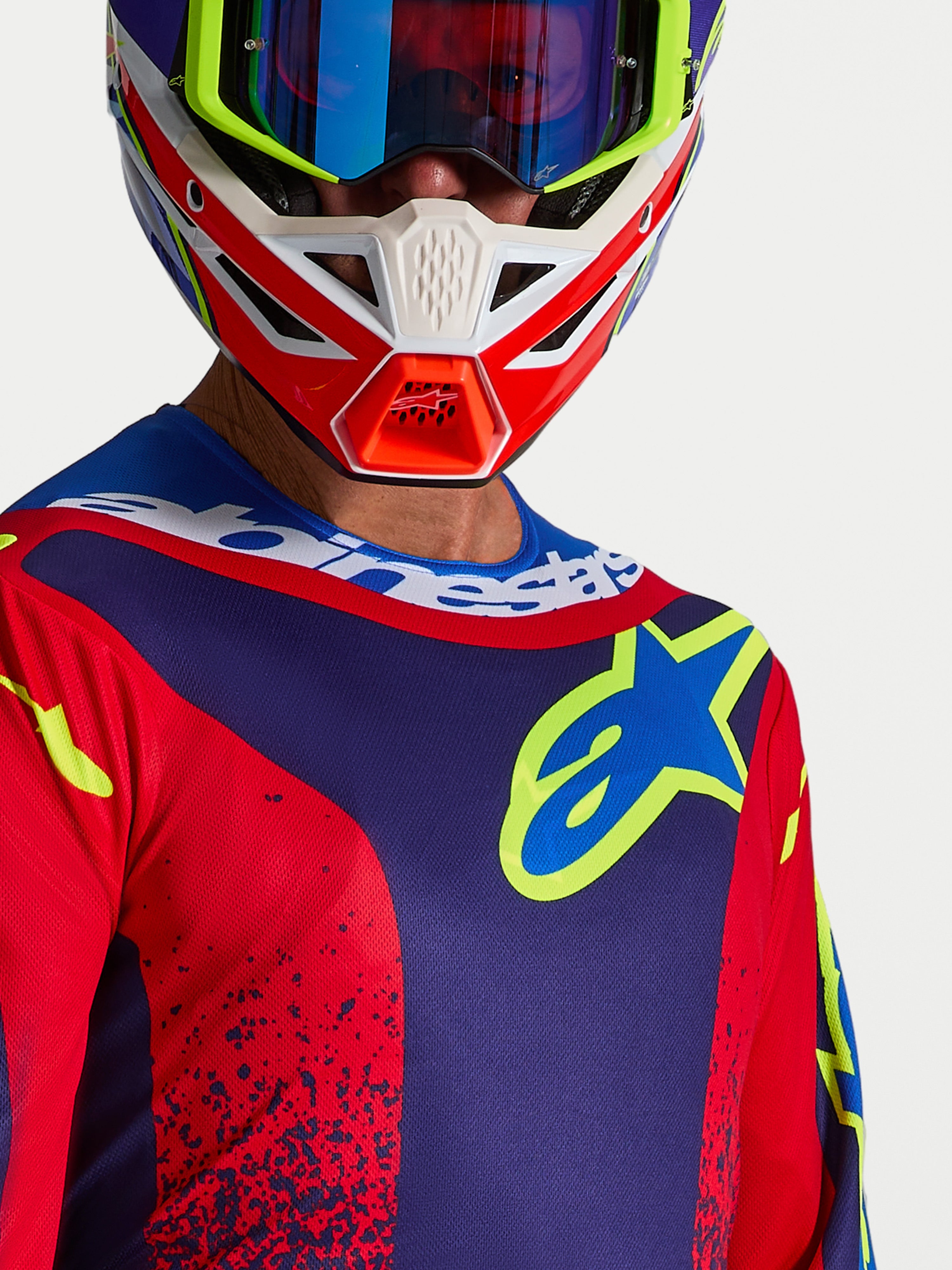 Alpinestars Fluid Drag Jersey, Men's Motocross Top in Blue Navy and Fire Red, showing the chest logo and sport collar.