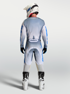 Alpinestars Racer Amber Pants, Men's Motocross Gear in Ash Gray and UCLA Blue, shown from the back in a full outfit.