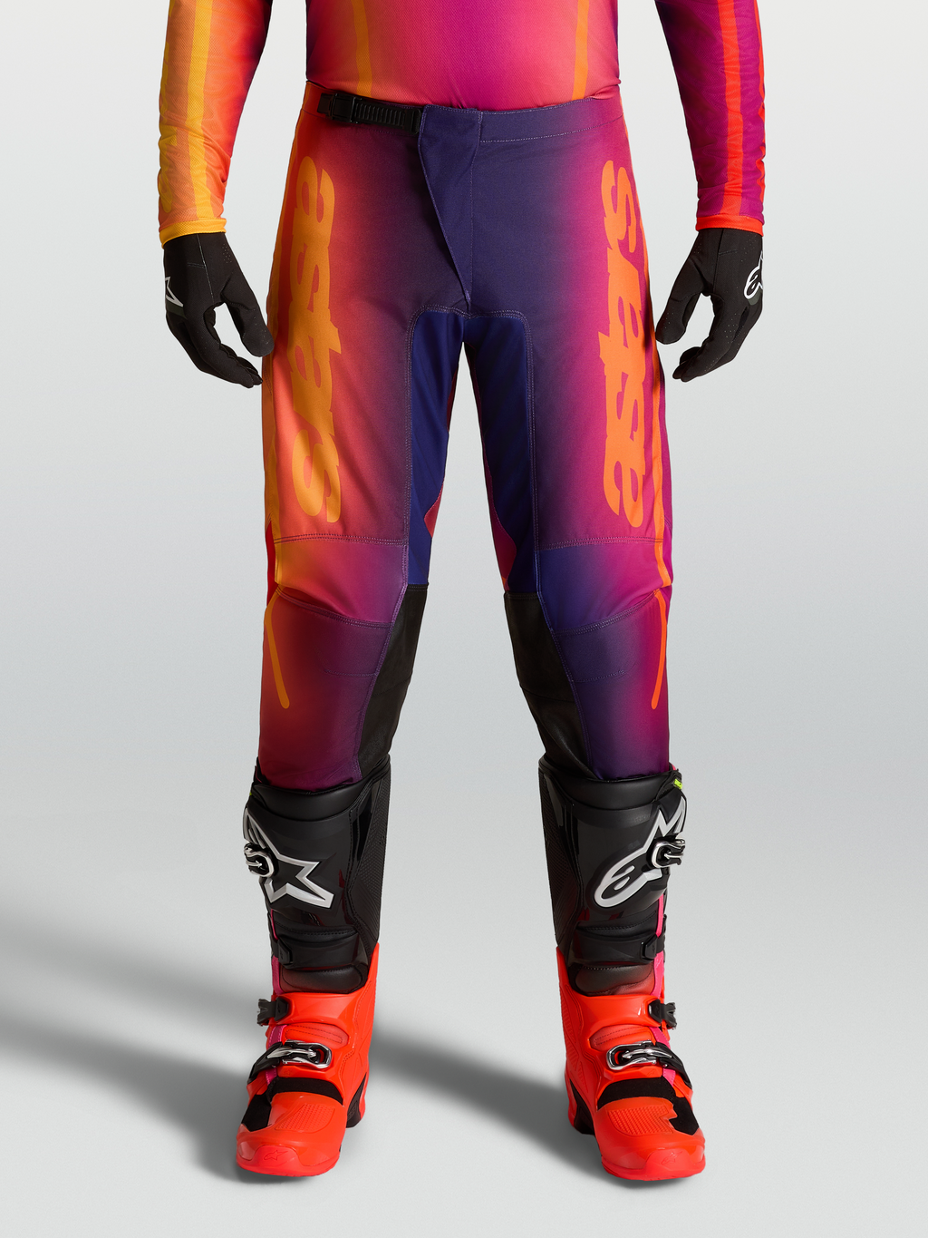 Alpinestars Fluid Kepler Pants, Men's Motocross Pants in Purple and Orange gradient with ergonomic pre-curved design.