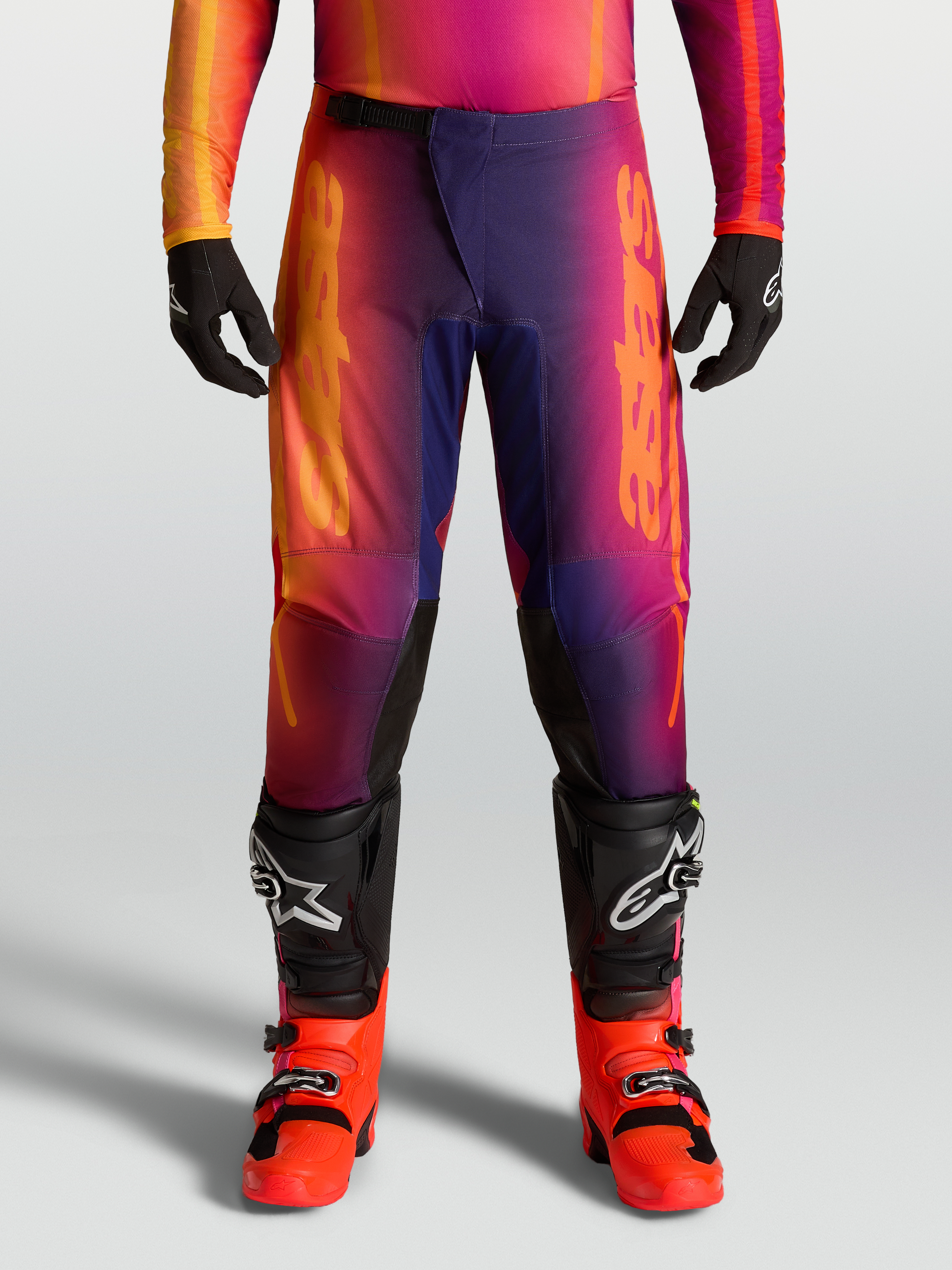 Alpinestars Fluid Kepler Pants, Men's Motocross Pants in Purple and Orange gradient with ergonomic pre-curved design.