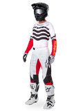 Alpinestars Limited Edition Techstar Deep Gear Set, full motocross racing apparel, white jersey with black wave patterns and red sleeves, white pants with red and black accents, black helmet with silver goggles, white and black gloves, white boots, coordinated MX racing outfit