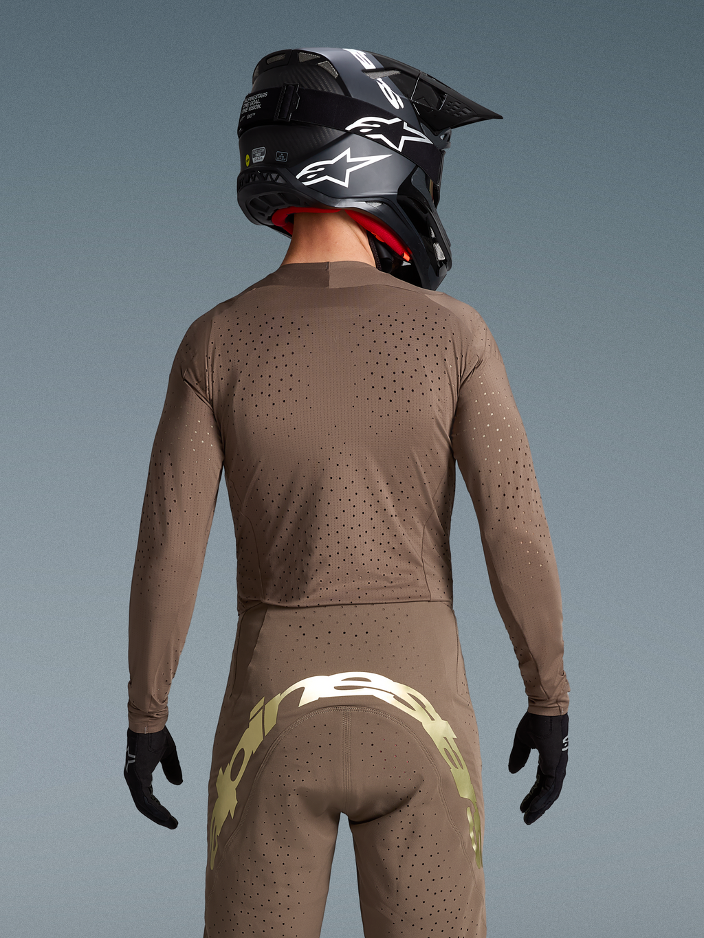 Alpinestars Limited Edition Supertech Air Gold Gear Set, Earth Brown and Gold Motocross Outfit with Laser-Cut Ventilation.