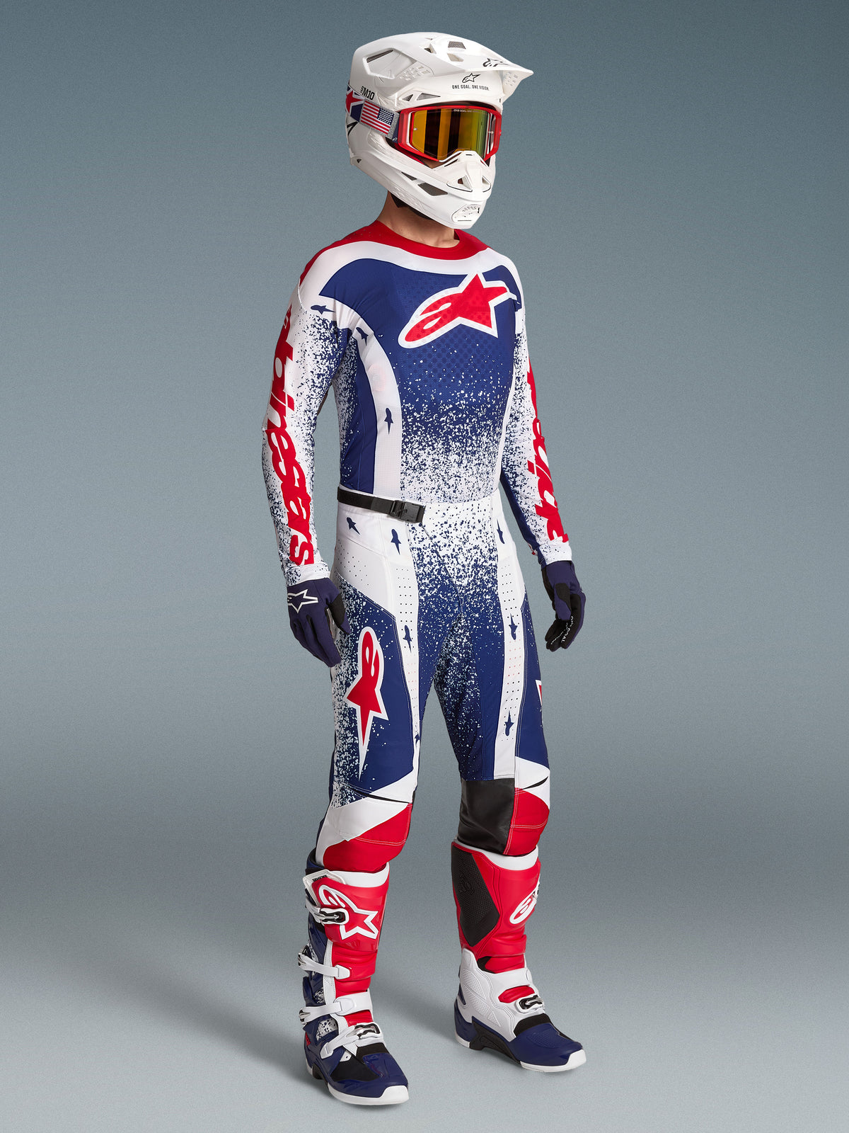 Alpinestars Techstar Unity Gear Set, Limited Edition Red, White, and Blue Motocross Jersey and Pants on model.
