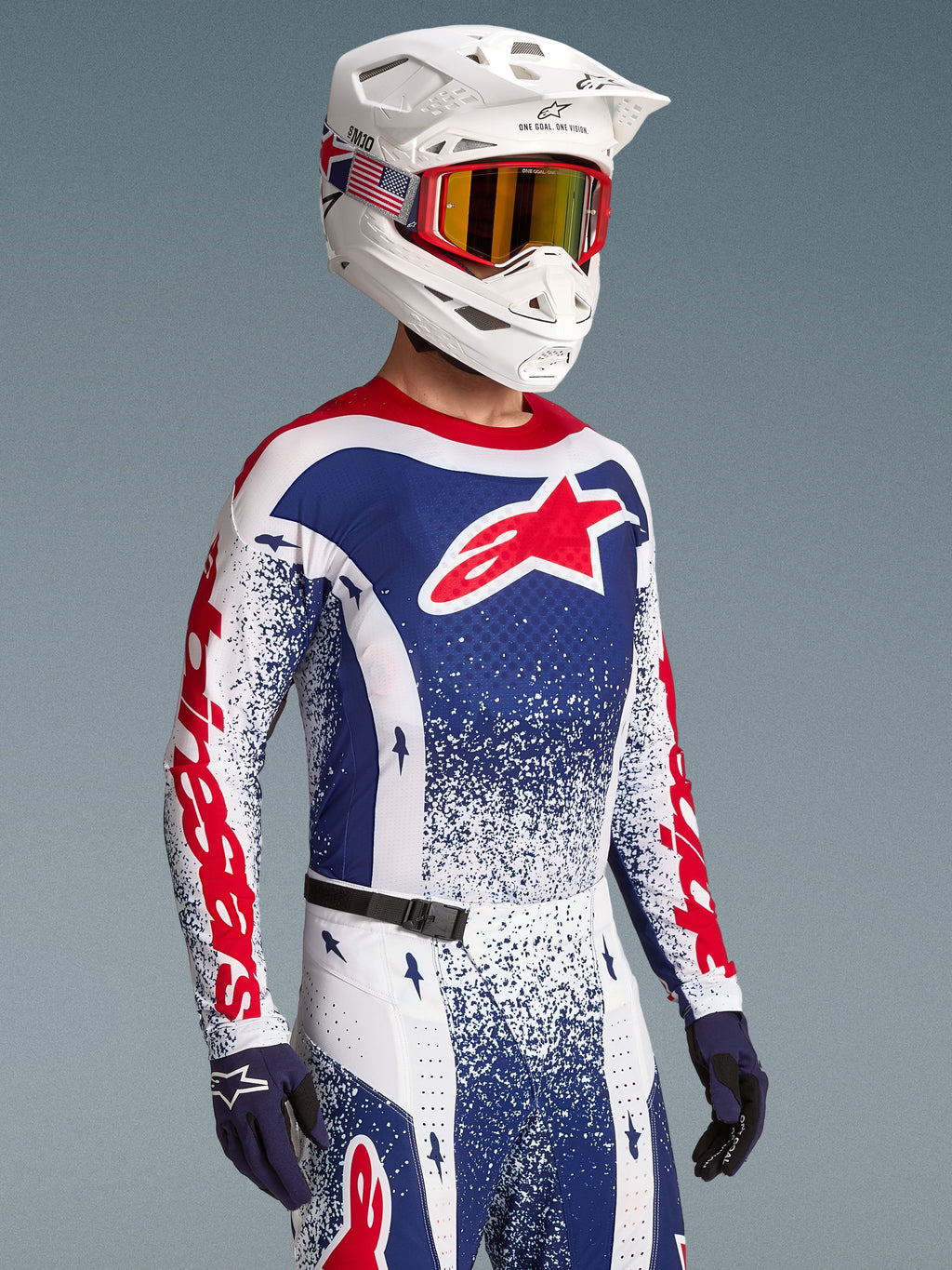 Alpinestars Limited Edition Techstar Unity Gear Set, a red, white, and blue motocross racing outfit with star graphics.