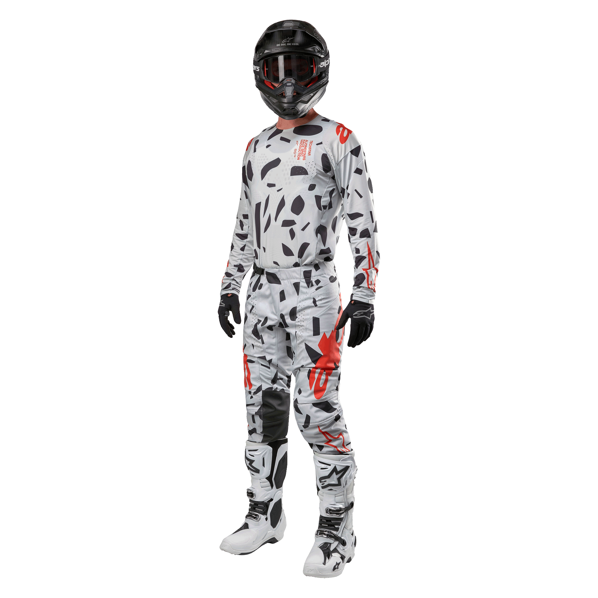 Motocross rider wearing Alpinestars 2024 Techstar Rantera Jersey in Haze Gray Camo, matching pants with red and black accents, black helmet and goggles, black gloves, white and black boots, complete coordinated motocross racing gear for off-road performance