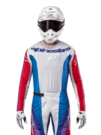 Alpinestars 2024 Techstar Pneuma Jersey, Motocross Jersey, Blue Mars Red and White, front view worn by a rider with white helmet and gloves, featuring laser-cut perforations on the chest and bold branding, athletic racing apparel for off-road