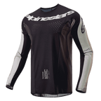 Alpinestars 2024 Techstar Pneuma Jersey, Motocross Jersey, Dark Sand and Iron Dust Gray, black main body with light gray sleeve panels, white Alpinestars logo across chest, laser-cut ventilation perforations, performance off-road riding gear