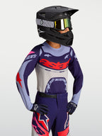 Alpinestars Youth Supertech Dyna Jersey, purple and red lightweight motocross jersey with athletic race-fit on-model.