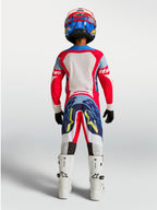 Alpinestars Youth Supertech Dyna Jersey and Gear Set, Fire Red and Navy Blue motocross racing outfit, rear view.