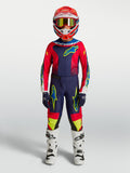 Alpinestars 2027 Youth Fluid Drag Jersey and pants, blue navy and fire red motocross gear with white boots.