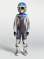 Alpinestars 2027 Youth Fluid Drag Gear Set, graystone and UCLA blue kids' motocross outfit for off-road racing performance.