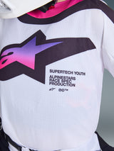 Alpinestars 2026 Youth Supertech Vista Jersey, Motocross Jersey, White with Purple and Pink gradient A-star logo, close-up of perforated stretch mesh fabric and magenta collar, featuring Supertech Youth Race Spec branding for off-road performance.