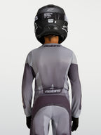 Alpinestars 2027 Youth Fluid Amber Jersey, Youth Motocross Jersey, Sand and Gray, breathable textile for off-road performance.